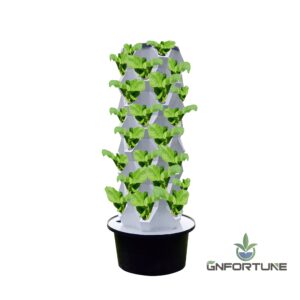 White vertical hydroponic garden tower kit with lettuce growing in every layer
